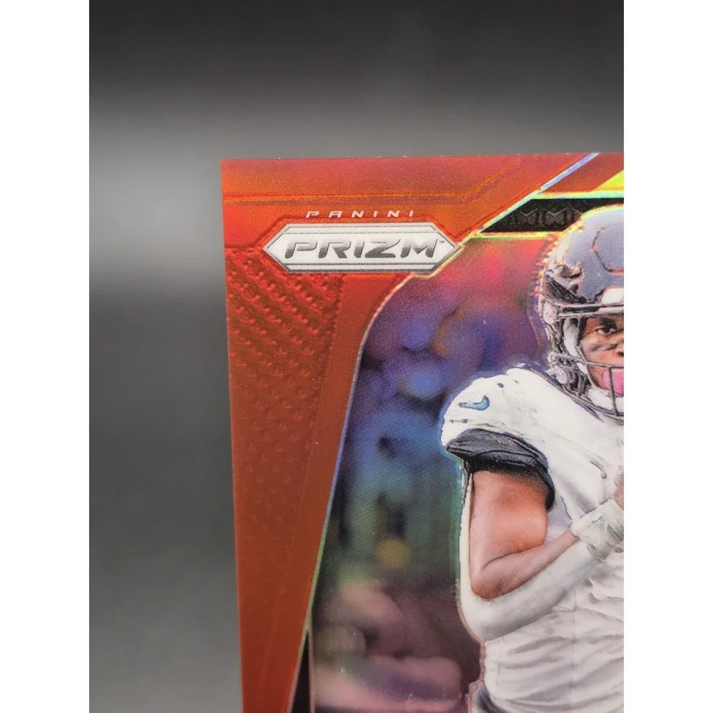 2024 Panini Prizm Travis Etienne Jr. #130 Red & Yellow Prizm /44 Jaguars